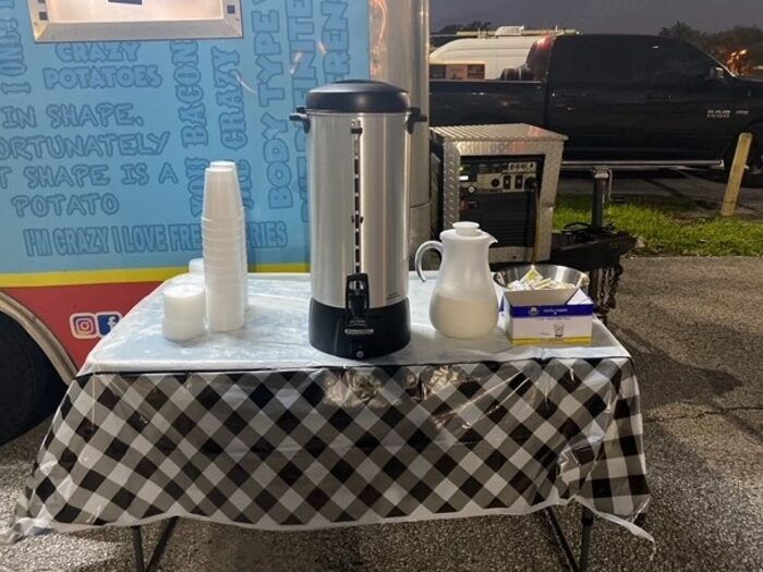 A food truck's overnight coffee and hot beverage service set up for disaster relief crews